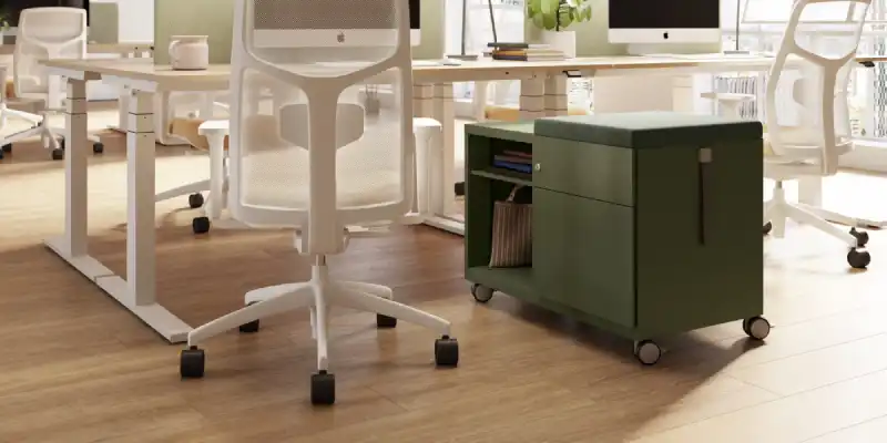 Personal mobile caddy beside hot desk