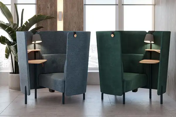 Single-user privacy work booth with a built-in desk and lamps