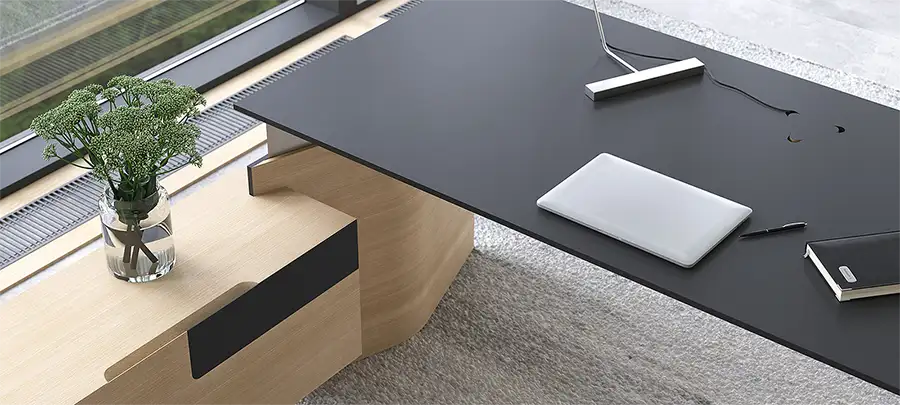 Executive height-adjustable desk with built-in return storage and wireless charging in desktop