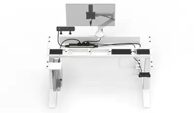 Desk fitted with cable management, electric source and monitor arm