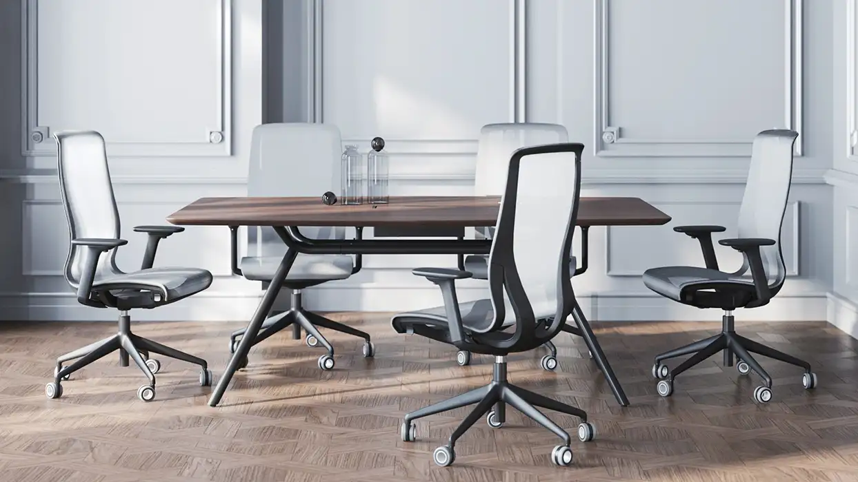 Small Arqus meeting table with mesh chairs