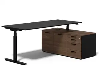 Height adjustable executive desk with storage return