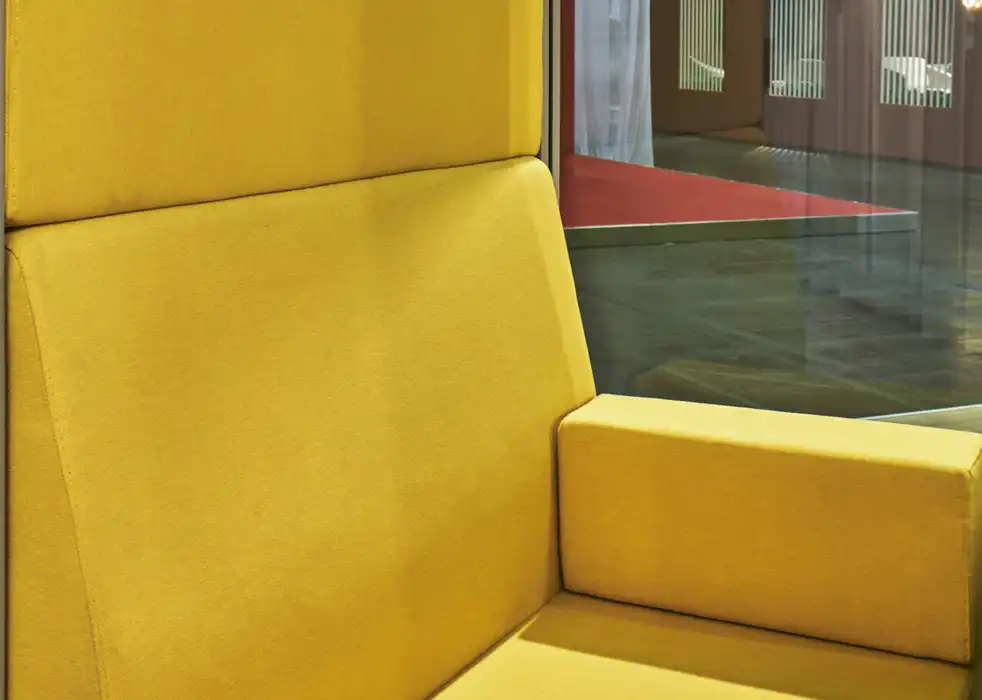 Calma Z2 pod with built-in sofa in yellow.