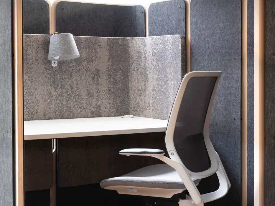 Inside the Coppice booth with acoustic panel & lamp