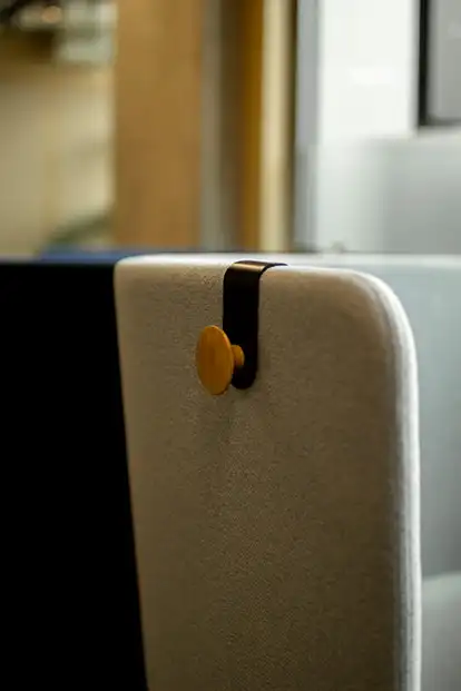 Diggs coat hook clamped onto side panel