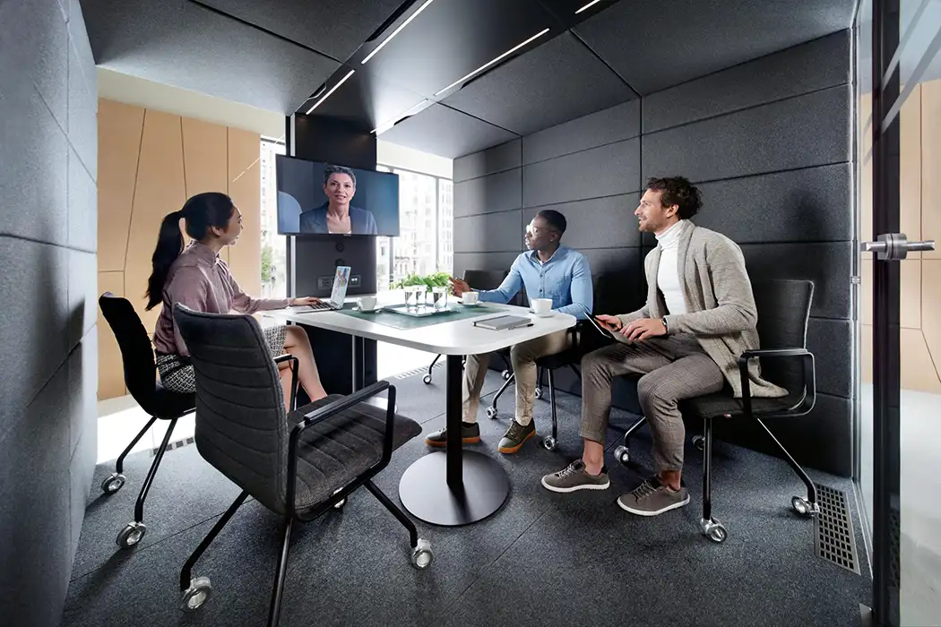 Inside the Hush meeting pod with built-in table, LED lighting & optional TV monitor arm