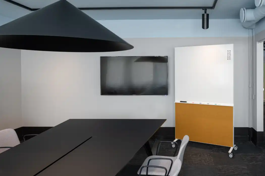 Alumi Combi Screen Alumi Combi screen with whiteboard in meeting room