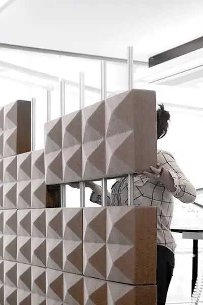 Fabricks modular office partition being assembled