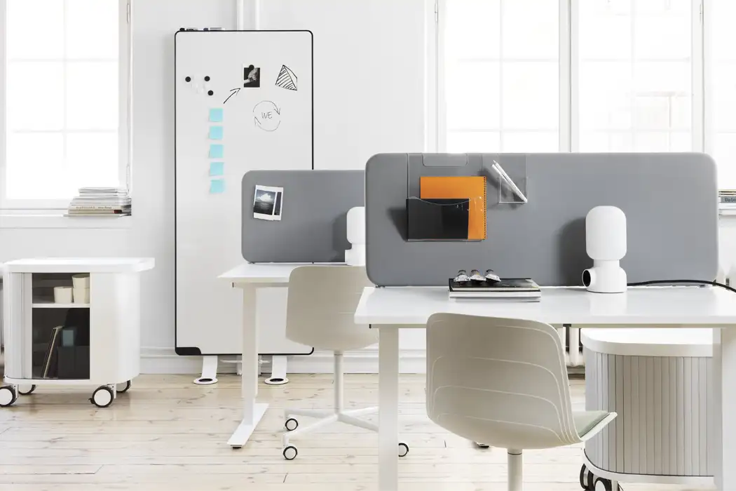 Softline grey desk screens with hanging magazine racks