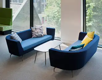 Rounded arm Cwtch contract sofas in waiting area