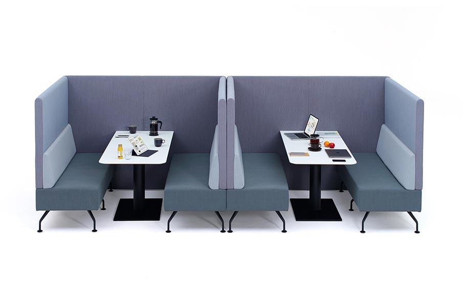 Perimeter banquette sofa with tables