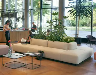 Modular island sofa system for perimeter or central seating in large reception rooms