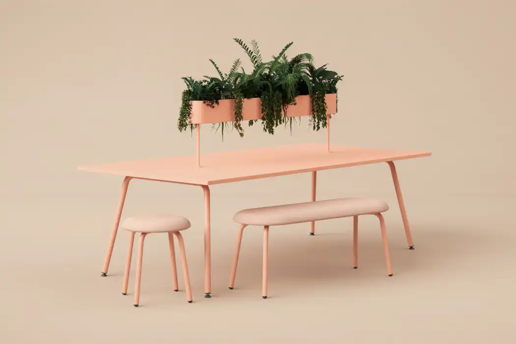 Peach coloured meeting table and stools