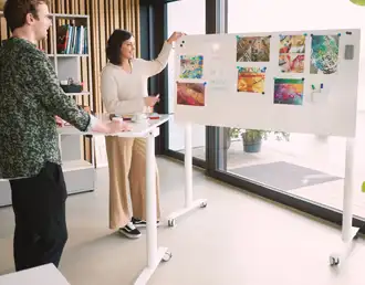 Mobile battery-powered adjustable desk with whiteboard surface